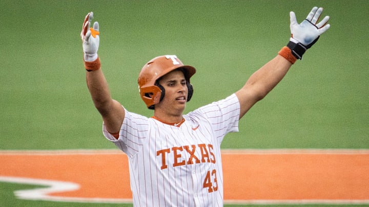 Texas Longhorns outfielder Tommy Farmer IV (43) celebrates making it to second base in the third inning as the Longhorns play the Auburn Tigers in the second game of a three-game series on Friday night at UFCU Disch-Falk Field in Austin, April 18, 2025.