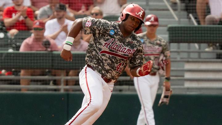 Jun 7, 2026; Tuscaloosa, AL, USA; Alabama base runner Eric Hines (42) goes from first to third on a hit in Game 2 of the Super Regional between Alabama and St. John's at Sewell-Thomas Stadium. Jun 7, 2026; Tuscaloosa, AL, USA; Alabama base runner Eric Hines (42) goes from first to third on a hit in Game 2 of the Super Regional between Alabama and St. John's at Sewell-Thomas Stadium.
