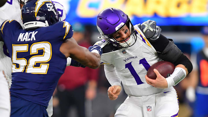 Oct 23, 2025; Inglewood, California, USA; Los Angeles Chargers linebacker Khalil Mack (52) tackles Minnesota Vikings quarterback Carson Wentz (11) during the first half at SoFi Stadium. Oct 23, 2025; Inglewood, California, USA; Los Angeles Chargers linebacker Khalil Mack (52) tackles Minnesota Vikings quarterback Carson Wentz (11) during the first half at SoFi Stadium.