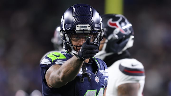 Oct 20, 2025; Seattle, Washington, USA; Seattle Seahawks wide receiver Jaxon Smith-Njigba (11) celebrates after a first down during the third quarter against the Houston Texans at Lumen Field. Mandatory Credit: Kevin Ng-Imagn Images