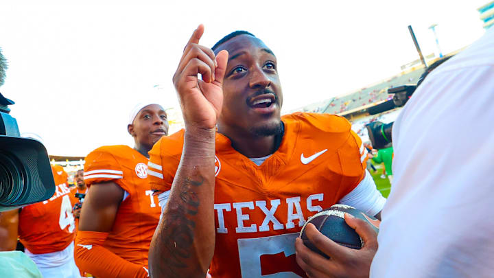 Texas Longhorns running back Quintrevion Wisner celebrates after the game against the Oklahoma Sooners at the Cotton Bowl. 