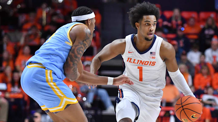 Dec 29, 2025; Champaign, Illinois, USA;  Illinois Fighting Illini guard Brandon Lee (1) with ball during the first half against the Southern University Jaguars at State Farm Center. Mandatory Credit: Ron Johnson-Imagn Images