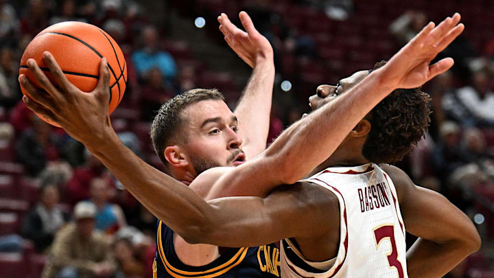 Cal's Milos Ilic, left, engages in physical defense against Florida State