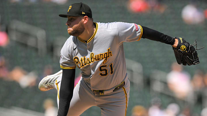 Jul 13, 2025; Minneapolis, Minnesota, USA; Pittsburgh Pirates relief pitcher David Bednar (51) delivers a pitch against the Minnesota Twins during the ninth inning at Target Field. Mandatory Credit: Nick Wosika-Imagn Images