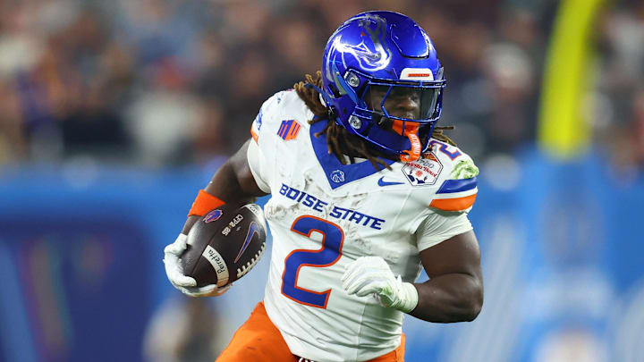 Dec 31, 2024; Glendale, AZ, USA; Boise State Broncos running back Ashton Jeanty (2) rushes the ball against the Penn State Nittany Lions during the first half in the Fiesta Bowl at State Farm Stadium. Mandatory Credit: Mark J. Rebilas-Imagn Images Dec 31, 2024; Glendale, AZ, USA; Boise State Broncos running back Ashton Jeanty (2) rushes the ball against the Penn State Nittany Lions during the first half in the Fiesta Bowl at State Farm Stadium. Mandatory Credit: Mark J. Rebilas-Imagn Images