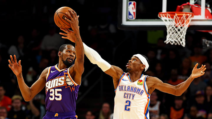 Mar 3, 2024; Phoenix, Arizona, USA; Phoenix Suns forward Kevin Durant (35) and Oklahoma City Thunder guard Shai Gilgeous-Alexander (2) go for the ball during the second quarter at Footprint Center. Mandatory Credit: Mark J. Rebilas-Imagn Images Mar 3, 2024; Phoenix, Arizona, USA; Phoenix Suns forward Kevin Durant (35) and Oklahoma City Thunder guard Shai Gilgeous-Alexander (2) go for the ball during the second quarter at Footprint Center. Mandatory Credit: Mark J. Rebilas-Imagn Images