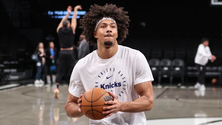 Jan 21, 2025; Brooklyn, New York, USA;  New York Knicks center Jericho Sims (20) warms up prior to the game against the Brooklyn Nets at Barclays Center. Mandatory Credit: Wendell Cruz-Imagn Images