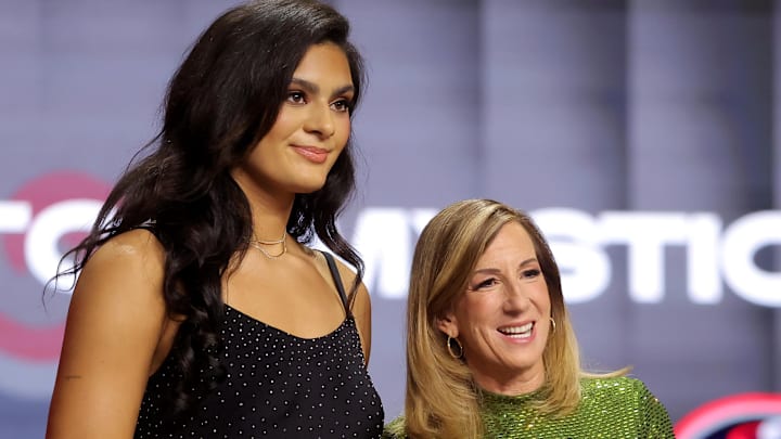 Apr 13, 2026; New York, NY, USA;  WNBA Commissioner Cathy Engelbert (right) poses for photos with Lauren Betts who was selected fourth overall by the Washington Mystics during the 2026 WNBA Draft at The Shed at Hudson Yards. Mandatory Credit: Brad Penner-Imagn Images