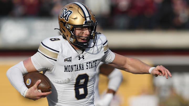 Montana State Bobcats quarterback Justin Lamson (8) scores a touchdown against the Montana Grizzlies