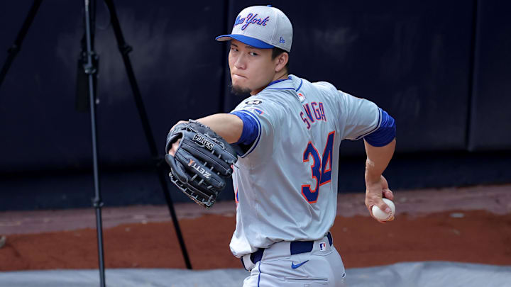 Jul 23, 2024; Bronx, New York, USA; New York Mets injured starting pitcher Kodai Senga (34) works out in the bullpen at Yankee Stadium before a game against the New York Yankees. Mandatory Credit: Brad Penner-Imagn Images