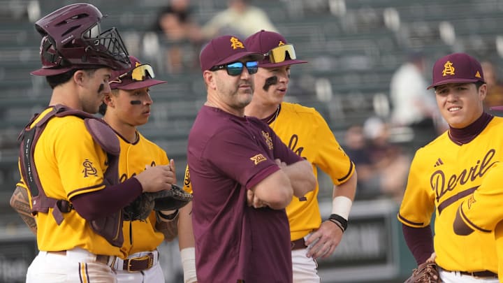 Arizona State manager Willie Bloomquist makes a pitching change during the seventh inning against Ohio State at Phoenix Municipal Stadium on Feb. 16, 2025.