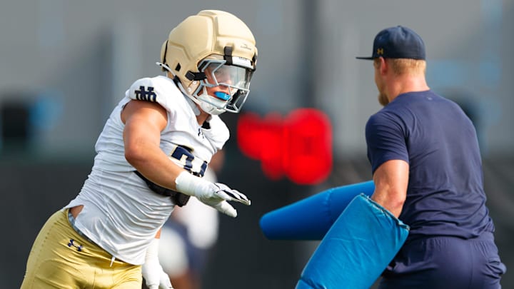 Notre Dame linebacker Drayk Bowen, left, runs through a drill during a football practice at Irish Athletic Center on Friday, Aug. 1, 2025, in South Bend. Notre Dame linebacker Drayk Bowen, left, runs through a drill during a football practice at Irish Athletic Center on Friday, Aug. 1, 2025, in South Bend.