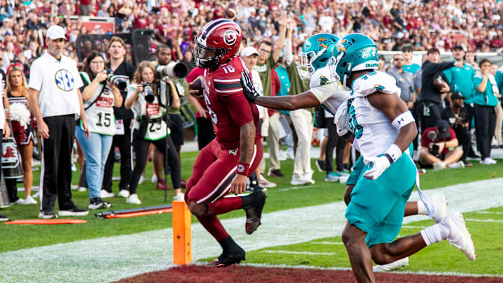 Nov 22, 2025; Columbia, South Carolina, USA; South Carolina Gamecocks quarterback Lanorris Sellers (16) scores a touchdown against the Coastal Carolina Chanticleers in the first quarter at Williams-Brice Stadium. Mandatory Credit: Jeff Blake-Imagn Images