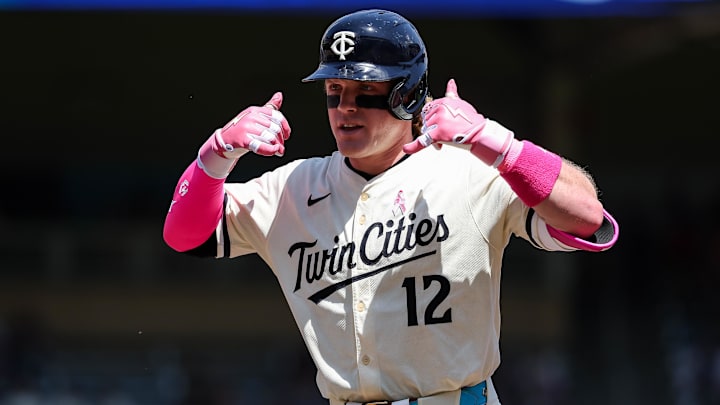 May 11, 2025; Minneapolis, Minnesota, USA; Minnesota Twins left fielder Harrison Bader (12) celebrates his single against the San Francisco Giants during the third inning at Target Field. May 11, 2025; Minneapolis, Minnesota, USA; Minnesota Twins left fielder Harrison Bader (12) celebrates his single against the San Francisco Giants during the third inning at Target Field.