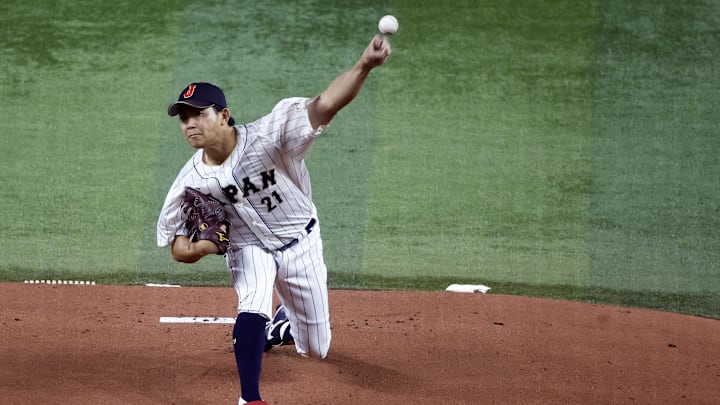 Mar 21, 2023; Miami, Florida, USA; Japan starting pitcher Shota Imanaga (21) pitches against the USA