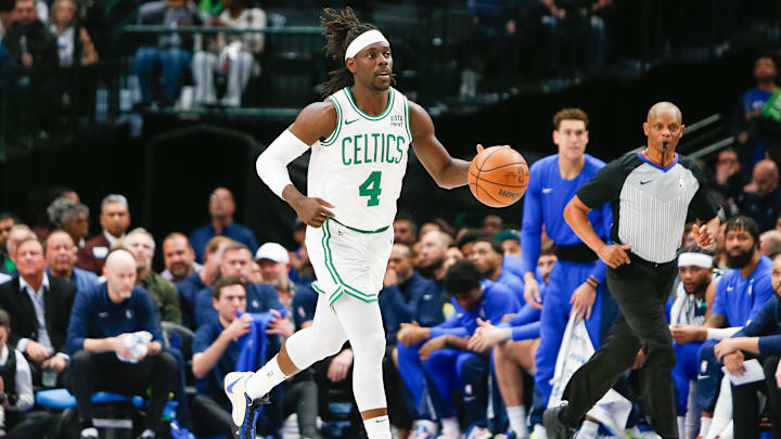 Jan 22, 2024; Dallas, Texas, USA; Boston Celtics guard Jrue Holiday (4) brings the ball up the court