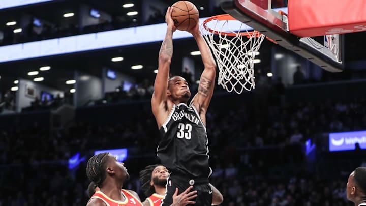 Mar 2, 2024; Brooklyn, New York, USA;  Brooklyn Nets center Nic Claxton (33) goes up for a dunk in the fourth quarter against the Atlanta Hawks at Barclays Center. Mandatory Credit: Wendell Cruz-Imagn Images