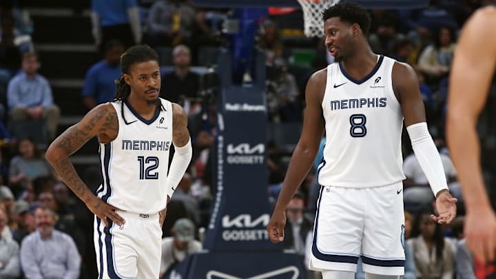 Nov 5, 2025; Memphis, Tennessee, USA; Memphis Grizzlies forward/center Jaren Jackson Jr. (8) talks with guard Ja Morant (12) during the second quarter against the Houston Rockets at FedExForum. Mandatory Credit: Petre Thomas-Imagn Images Nov 5, 2025; Memphis, Tennessee, USA; Memphis Grizzlies forward/center Jaren Jackson Jr. (8) talks with guard Ja Morant (12) during the second quarter against the Houston Rockets at FedExForum. Mandatory Credit: Petre Thomas-Imagn Images