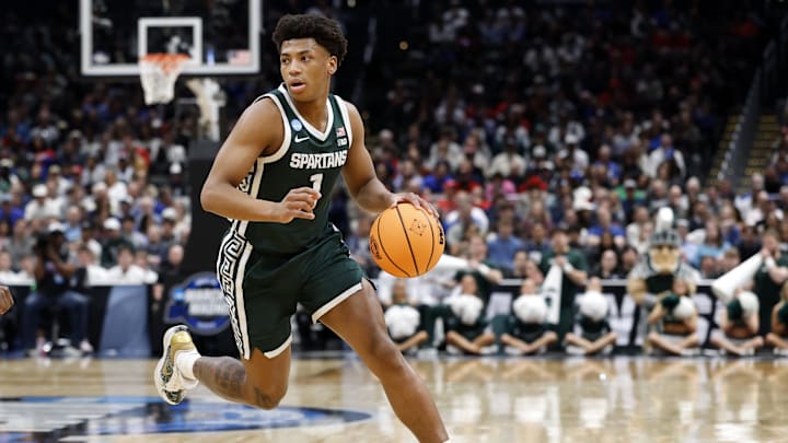 Mar 27, 2026; Washington, DC, USA; Michigan State Spartans guard Jeremy Fears Jr. (1) dribbles the ball against the UConn Huskies in the first half during a Sweet Sixteen game of the East Regional of the men's 2026 NCAA Tournament at Capital One Arena. Mandatory Credit: Amber Searls-Imagn Images Mar 27, 2026; Washington, DC, USA; Michigan State Spartans guard Jeremy Fears Jr. (1) dribbles the ball against the UConn Huskies in the first half during a Sweet Sixteen game of the East Regional of the men's 2026 NCAA Tournament at Capital One Arena. Mandatory Credit: Amber Searls-Imagn Images