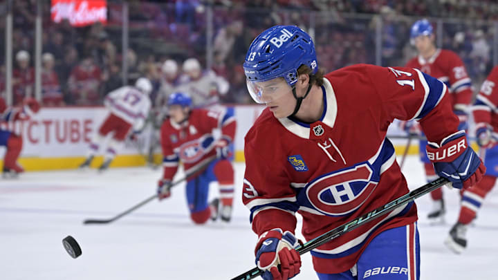 Oct 18, 2025; Montreal, Quebec, CAN; Montreal Canadiens forward Cole Caufield (13) juggles a puck during the warmup period before the game against the New York Rangers at the Bell Centre. Mandatory Credit: Eric Bolte-Imagn Images
