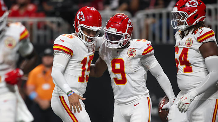 Sep 22, 2024; Atlanta, Georgia, USA; Kansas City Chiefs quarterback Patrick Mahomes (15) and wide receiver JuJu Smith-Schuster (9) celebrate after a touchdown against the Atlanta Falcons in the third quarter at Mercedes-Benz Stadium. Mandatory Credit: Brett Davis-Imagn Images