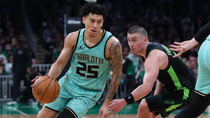 Apr 13, 2025; Boston, Massachusetts, USA; Charlotte Hornets guard KJ Simpson (25) drives to the basket during the second half against the Boston Celtics at TD Garden. Mandatory Credit: Paul Rutherford-Imagn Images
