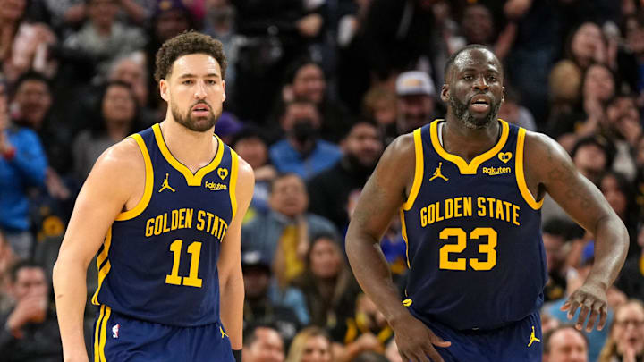 Jan 27, 2024; San Francisco, California, USA; Golden State Warriors guard Klay Thompson (11) and forward Draymond Green (23) during the third quarter against the Los Angeles Lakers at Chase Center. Mandatory Credit: Darren Yamashita-USA TODAY Sports