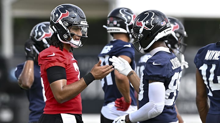 Jun 10, 2025; Houston, TX, USA; Houston Texans quarterback C.J. Stroud (7) and wide receiver Xavier Johnson (89) interact during an NFL football minicamp at NRG Stadium. Mandatory Credit: Maria Lysaker-Imagn Images 