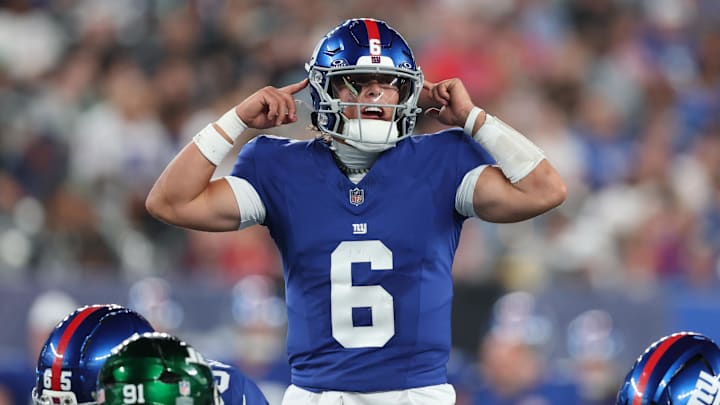Aug 16, 2025; East Rutherford, New Jersey, USA; New York Giants quarterback Jaxson Dart (6) signals during the second half against the New York Jets at MetLife Stadium. Mandatory Credit: Vincent Carchietta-Imagn Images