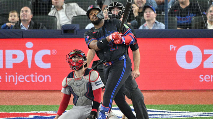 Sep 25, 2024; Toronto, Ontario, CAN; Toronto Blue Jays first baseman Vladimir Guerrero Jr. (27) hits a double against the Boston Red Sox in the fourth inning at Rogers Centre. Mandatory Credit: Dan Hamilton-Imagn Images Sep 25, 2024; Toronto, Ontario, CAN; Toronto Blue Jays first baseman Vladimir Guerrero Jr. (27) hits a double against the Boston Red Sox in the fourth inning at Rogers Centre. Mandatory Credit: Dan Hamilton-Imagn Images