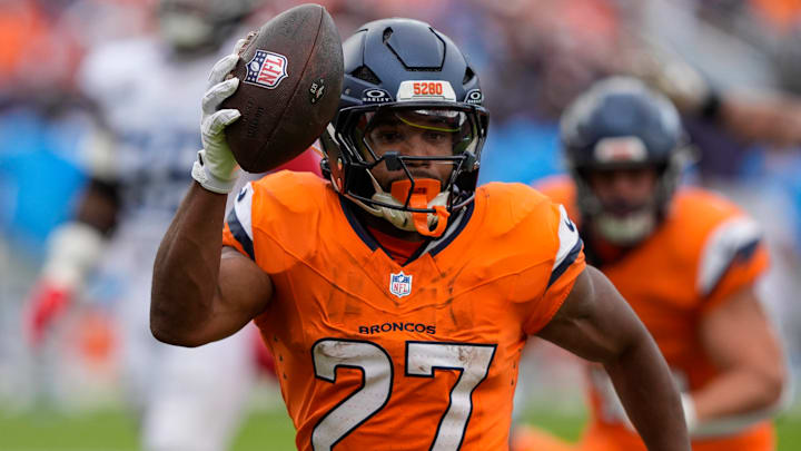September 7, 2025: Denver Broncos running back J.K. Dobbins (27) shows off the ball as he scampers in to the end zone in the second half of the football game between the Denver Broncos and Tennessee Titans. 