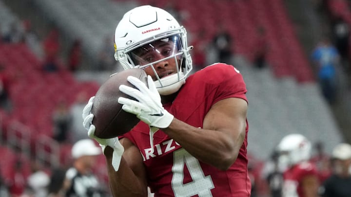 Arizona Cardinals receiver Rondale Moore (4) warms up before their game against the Atlanta Falcons at State Farm Stadium in Glendale on Nov. 12, 2023. Arizona Cardinals receiver Rondale Moore (4) warms up before their game against the Atlanta Falcons at State Farm Stadium in Glendale on Nov. 12, 2023.