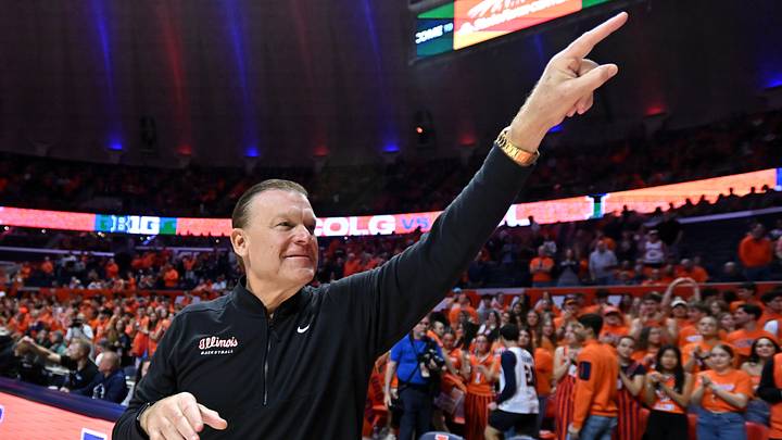 Nov 14, 2025; Champaign, Illinois, USA; Illinois Fighting Illini head coach Brad Underwood greets the crowd before the tip of the game with the Colgate Raiders at State Farm Center. Mandatory Credit: Ron Johnson-Imagn Images Nov 14, 2025; Champaign, Illinois, USA; Illinois Fighting Illini head coach Brad Underwood greets the crowd before the tip of the game with the Colgate Raiders at State Farm Center. Mandatory Credit: Ron Johnson-Imagn Images