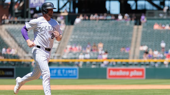 Jun 5, 2024; Denver, Colorado, USA; Colorado Rockies third base Ryan McMahon (24) runs home to score during the first inning against the Cincinnati Reds at Coors Field. Mandatory Credit: Andrew Wevers-USA TODAY Sports Jun 5, 2024; Denver, Colorado, USA; Colorado Rockies third base Ryan McMahon (24) runs home to score during the first inning against the Cincinnati Reds at Coors Field. Mandatory Credit: Andrew Wevers-USA TODAY Sports