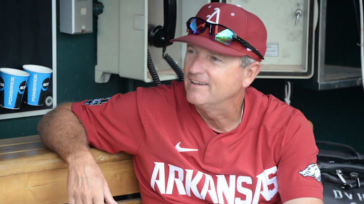 Jun 20, 2018; Omaha, NE, USA; Arkansas Razorbacks head coach Dave Van Horn waits out a rain delay before the game against the Texas Tech Red Raiders in the College World Series at TD Ameritrade Park. Mandatory Credit: Steven Branscombe-Imagn Images