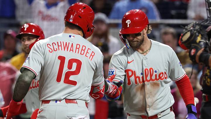 May 15, 2026; Pittsburgh, Pennsylvania, USA;  Philadelphia Phillies first baseman Bryce Harper (right) greets designated hitter Kyle Schwarber (12) crossing home plate on a two-run home run which was his second home run of the game during the seventh inning against the Pittsburgh Pirates at PNC Park. 