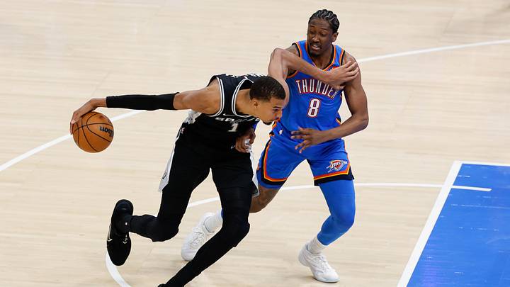 May 18, 2026; Oklahoma City, Oklahoma, USA; San Antonio Spurs center Victor Wembanyama (1) drives the ball past Oklahoma City Thunder forward Jalen Williams (8) during game one of the western conference finals for the 2026 NBA playoffs at Paycom Center. Mandatory Credit: Alonzo Adams-Imagn Images May 18, 2026; Oklahoma City, Oklahoma, USA; San Antonio Spurs center Victor Wembanyama (1) drives the ball past Oklahoma City Thunder forward Jalen Williams (8) during game one of the western conference finals for the 2026 NBA playoffs at Paycom Center. Mandatory Credit: Alonzo Adams-Imagn Images