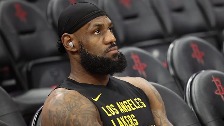 Nov 8, 2023; Houston, Texas, USA;  Los Angeles Lakers forward LeBron James (23) sits on the bench