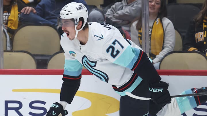 Nov 22, 2025; Pittsburgh, Pennsylvania, USA; Seattle Kraken left wing Mason Marchment (27) reacts after scoring a goal against the Pittsburgh Penguins during the second period at PPG Paints Arena. Mandatory Credit: Charles LeClaire-Imagn Images