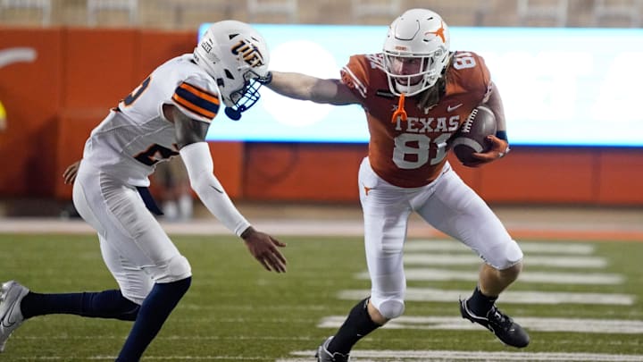 Sep 12, 2020; Austin, Texas, USA; Texas Longhorns wide receiver Brenden Schooler (81) escapes tackle attempt by Texas El Paso Miners defensive back Josh Caldwell (22) in the first half at Darrell K Royal-Texas Memorial Stadium. Mandatory Credit: Scott Wachter-Imagn Images Sep 12, 2020; Austin, Texas, USA; Texas Longhorns wide receiver Brenden Schooler (81) escapes tackle attempt by Texas El Paso Miners defensive back Josh Caldwell (22) in the first half at Darrell K Royal-Texas Memorial Stadium. Mandatory Credit: Scott Wachter-Imagn Images