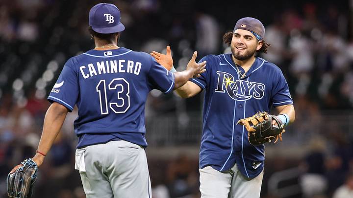 Sep 9, 2026; Atlanta, Georgia, USA; Tampa Bay Rays third baseman Junior Caminero (13) and first baseman Jonathan Aranda (8) celebrate after a victory over the Atlanta Braves at Truist Park. Mandatory Credit: Brett Davis-Imagn Images Sep 9, 2026; Atlanta, Georgia, USA; Tampa Bay Rays third baseman Junior Caminero (13) and first baseman Jonathan Aranda (8) celebrate after a victory over the Atlanta Braves at Truist Park. Mandatory Credit: Brett Davis-Imagn Images