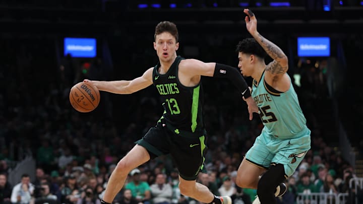 Apr 13, 2025; Boston, Massachusetts, USA; Boston Celtics forward Drew Peterson (13) dribbles down the court during the first half against the Charlotte Hornets at TD Garden. Mandatory Credit: Paul Rutherford-Imagn Images Apr 13, 2025; Boston, Massachusetts, USA; Boston Celtics forward Drew Peterson (13) dribbles down the court during the first half against the Charlotte Hornets at TD Garden. Mandatory Credit: Paul Rutherford-Imagn Images