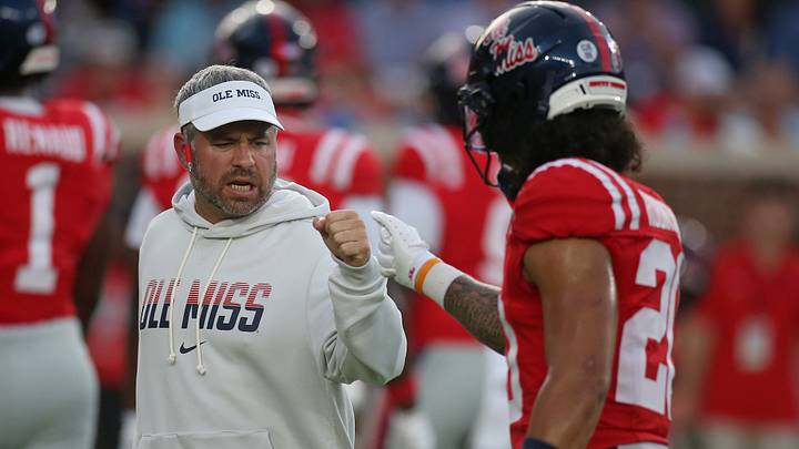 Ole Miss Rebels head Coach Pete Golding reacts with Mississippi Rebels safety Anthony Robinson III (20) during warm ups prior to the game against the Charlotte 49ers at Vaught-Hemingway Stadium. Ole Miss Rebels head Coach Pete Golding reacts with Mississippi Rebels safety Anthony Robinson III (20) during warm ups prior to the game against the Charlotte 49ers at Vaught-Hemingway Stadium.