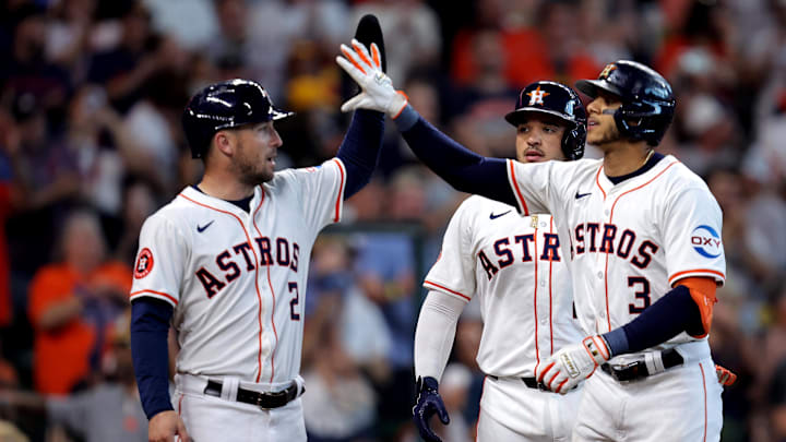 Sep 7, 2024; Houston, Texas, USA; Houston Astros shortstop Jeremy Peña (3) is congratulated by Houston Astros third baseman Alex Bregman (2) after hitting a three-run home run against the Arizona Diamondbacks during the sixth inning at Minute Maid Park.