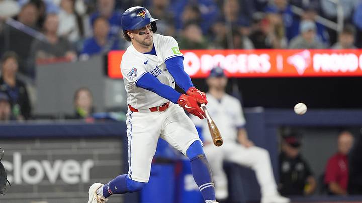 Jun 25, 2026; Toronto, Ontario, CAN; Toronto Blue Jays shortstop Ernie Clement (22) hits a single against the Texas Rangers during the ninth inning at Rogers Centre. Mandatory Credit: John E. Sokolowski-Imagn Images Jun 25, 2026; Toronto, Ontario, CAN; Toronto Blue Jays shortstop Ernie Clement (22) hits a single against the Texas Rangers during the ninth inning at Rogers Centre. Mandatory Credit: John E. Sokolowski-Imagn Images