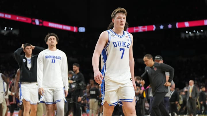 Apr 5, 2025; San Antonio, TX, USA; Duke Blue Devils guard Kon Knueppel (7) walks off the court after losing to the Houston Cougars in the semifinals of the men's Final Four of the 2025 NCAA Tournament at the Alamodome. Mandatory Credit: Robert Deutsch-Imagn Images