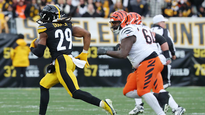 Nov 16, 2025; Pittsburgh, Pennsylvania, USA; Pittsburgh Steelers safety Kyle Dugger (29) intercepts the ball against the Cincinnati Bengals during the second half at Acrisure Stadium. Mandatory Credit: Charles LeClaire-Imagn Images