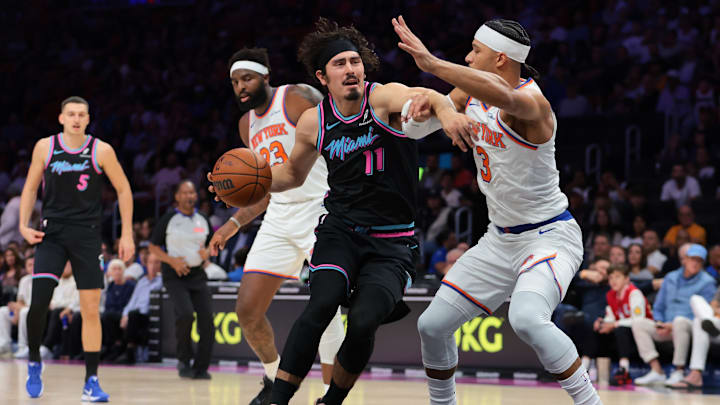 Nov 17, 2025; Miami, Florida, USA; Miami Heat forward Jaime Jaquez Jr. (11) drives to the basket against New York Knicks guard Josh Hart (3) during the first quarter at Kaseya Center. Mandatory Credit: Sam Navarro-Imagn Images