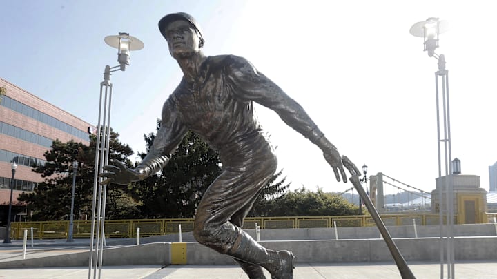 Sep 15, 2024; Pittsburgh, Pennsylvania, USA;   The statue of former Pittsburgh Pirates right fielder Roberto Clemente (21) outside of PNC Park. Major League Baseball celebrates Roberto Clemente Day on this day each year in memory of Clemente who died when the plane he was in carrying supplies to aid humanitarian efforts to those who suffered in a Nicaraguan earthquake crashed on New Years Eve 1973. Mandatory Credit: Charles LeClaire-Imagn Images