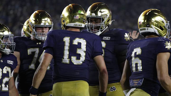 Sep 19, 2026; South Bend, Indiana, USA; Notre Dame Fighting Irish offensive line Will Black (74) and offensive line Guerby Lambert (76) celebrate with quarterback CJ Carr (13) after a touchdown against the Michigan State Spartans during the second half at Notre Dame Stadium. Mandatory Credit: Michael Caterina-Imagn Images Sep 19, 2026; South Bend, Indiana, USA; Notre Dame Fighting Irish offensive line Will Black (74) and offensive line Guerby Lambert (76) celebrate with quarterback CJ Carr (13) after a touchdown against the Michigan State Spartans during the second half at Notre Dame Stadium. Mandatory Credit: Michael Caterina-Imagn Images